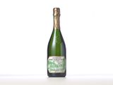 an image of a bottle of champagne sitting on a table
