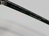 a close up of a pair of glasses on a table