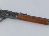 a gun that is laying on top of a table