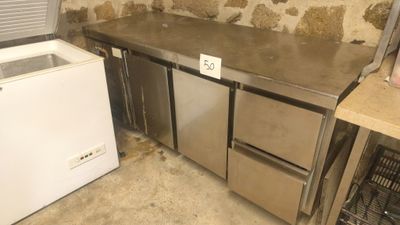a kitchen with a sink, refrigerator and dishwasher in it