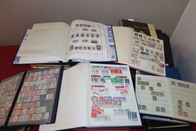 many different types of stamps on the pages of a book