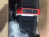 a box with a cell phone inside of it