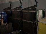 a room with a lot of boxes and luggage on the floor
