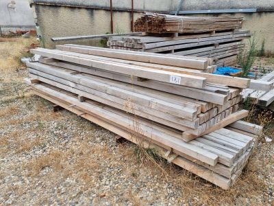 many pieces of wood stacked on top of each other