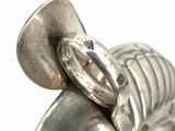 a close up of a silver statue of a horse