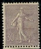 un timbre sur lequel figure l'image d'une femme