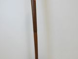 an image of a lamp that is on a wooden stand