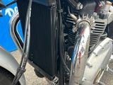 a close up of a motorcycle with a radiator on the back of it