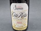 a bottle of wine that is sitting on a table