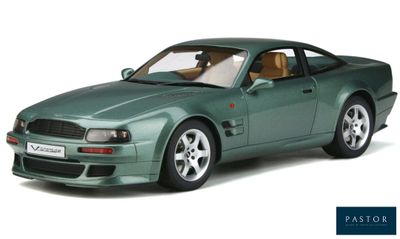 the green model of a sports car is shown on a white background