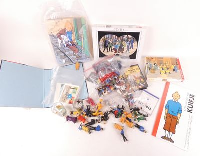 beaucoup de jouets et de livres sur la table