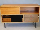 an image of a wooden cabinet with drawers and drawers
