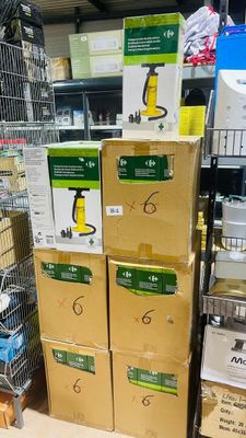many boxes that are stacked up in a store