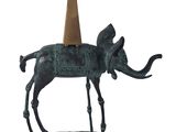 statue of an elephant with a cone on its head