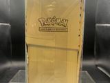 a close up of a box of pokemon cards on a table