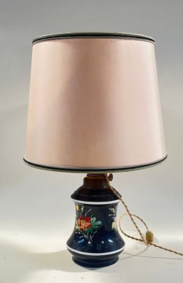 an image of a blue lamp with a pink shade on top of it