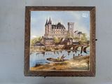 une photo d'un tableau représentant un château accroché au mur