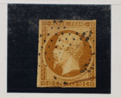 un vieux timbre sur lequel figure l'image d'une femme