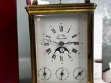 a clock that is sitting on top of a table