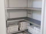 many boxes of food on shelves in a room