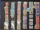 many different types of stamps on display on the table