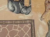a rug with a picture of a giraffe and a zebra on it
