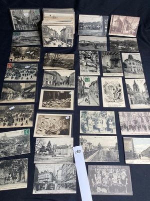 several old black and white photos of people and buildings on a table