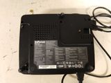 an image of a laptop charger sitting on top of a table