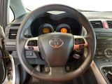 a close up of a steering wheel and dashboard of a car