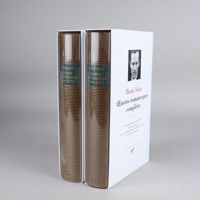 two books sitting on top of each other next to each other