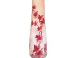 a glass vase with flowers in it on a white background