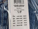 the back of a pair of jeans with a price tag on it