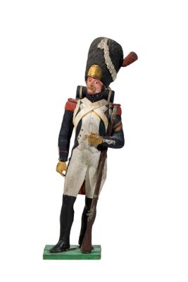 figurine représentant un soldat en uniforme, muni d'un fusil