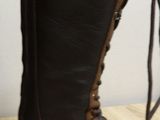 a close up of a pair of boots on a table