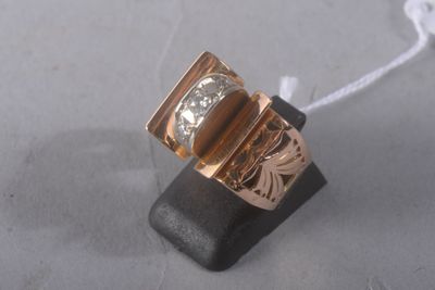 an image of a gold ring with a diamond on top of it