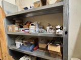 a shelf with many items on it in a room