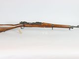 a rifle with a wooden barrel on a white background