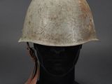 a close up of a helmet on a mannequin head