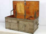 an old trunk that is sitting on a table