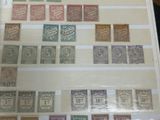 a picture of a collection of stamps on a table