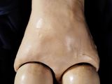 a close up view of a fake human foot