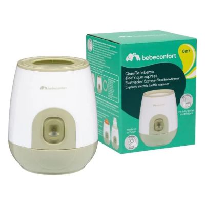 un petit humidificateur posé à côté d'une boîte sur un fond blanc