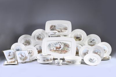 un grand ensemble d'assiettes, de tasses et de soucoupes en porcelaine