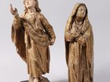 two statues of jesus and mary are shown on a white background