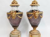 pair of antique vases with gold and purple decoration on stands