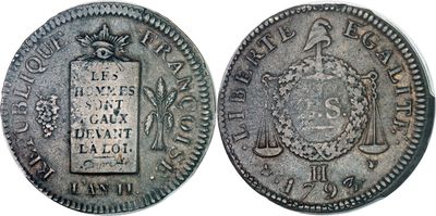 une vieille pièce d'argent portant un sceau au recto et un autre au verso