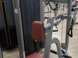 a gym equipment in a gym room with a lot of machines