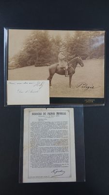an old photo of a man riding a horse in a field