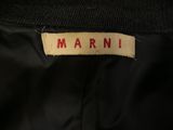 a close up of a label on a black jacket