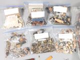 many different types of screws and nuts in the bag
